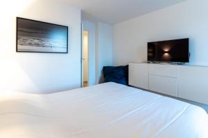 Appartements Paris Plage Vacances - Sublime T2 renove avec piscine tennis parking wifi : photos des chambres