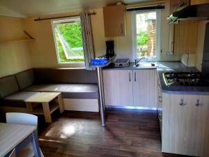 Campings Mobil-home dans la foret haute et tranquille : photos des chambres