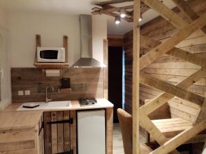 Appartements Le paon de bois : photos des chambres