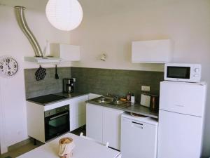 Appartements Charmant logement pres du centre ville : photos des chambres