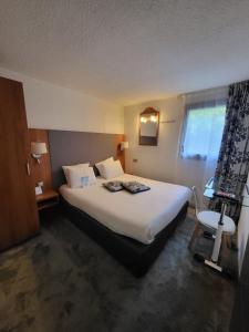 Hotels Kyriad Saint Quentin en Yvelines - Montigny : photos des chambres