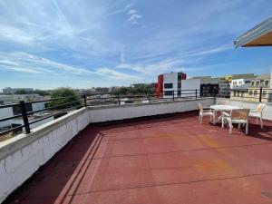 Sejours chez l'habitant Rooftop vue sur le stade de France : photos des chambres