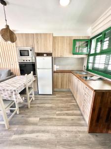 Kiwi Smoothie - En la playa, doble terraza, cocina completa, dos camas y Wifi