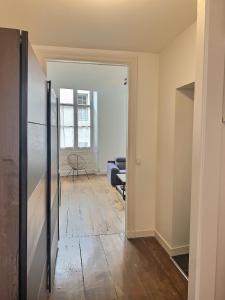 Appartements WONDERHOST, superbes volumes et charme de l-ancien : photos des chambres