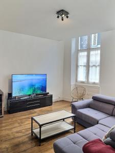 Appartements WONDERHOST, superbes volumes et charme de l-ancien : photos des chambres