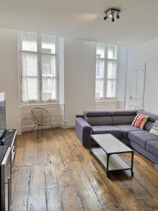 Appartements WONDERHOST, superbes volumes et charme de l-ancien : photos des chambres