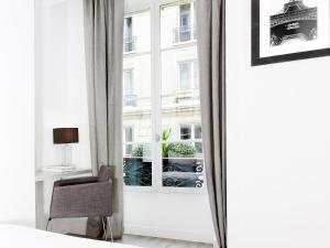 Appartements LivinParis - Luxury 3 Bedrooms Grands-Boulevards I : photos des chambres