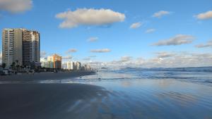 Apartamento na Praia Grande II - Pé na Areia