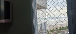 Apartamento na Praia Grande II - Pé na Areia
