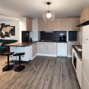 Appartements Appartement T3 avec jardin et parking privatifs : photos des chambres