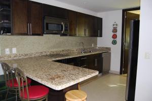 Casa Adams Torre 13-202 Mayan Lakes Resort