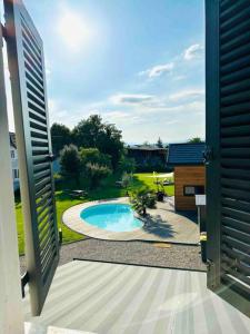 Maisons de vacances Charme et detente avec piscine proche de Mulhouse : Maison 3 Chambres