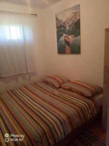 Family-friendly apartments with swimming pool Lovinac, Velebit - 21748