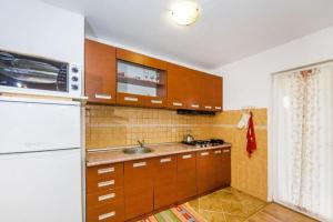 Family friendly apartments with a swimming pool Lovinac, Velebit - 21748