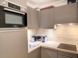 Cocon cosy de 40m², 2 chambres, balcon, pour 5 pers aux Menuires - FR-1-178-379