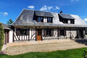 Maisons de vacances Longere normande renovee avec piscine : photos des chambres