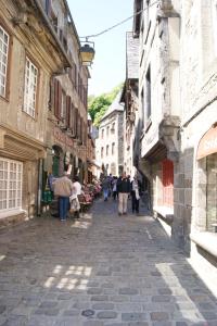 Appartements Au Fil De L'eau - Les Remparts : photos des chambres