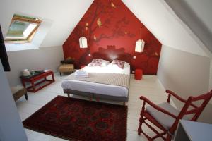 B&B / Chambres d'hotes La Haute Flourie - bed and breakfast : photos des chambres