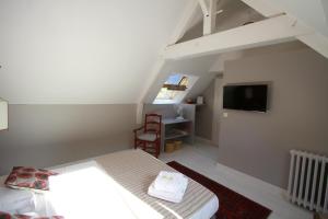 B&B / Chambres d'hotes La Haute Flourie - bed and breakfast : photos des chambres