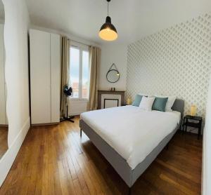 Appartements VILLEMOMBLE 2 centre ville : photos des chambres