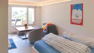 Modernes Alpenstudio mit Bergblick, Pool und Sauna