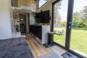 Chalets Mini maison Tiny house 6 per 3800m2 jardin Jacuzzi : photos des chambres