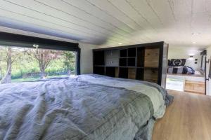 Chalets Mini maison Tiny house 6 per 3800m2 jardin Jacuzzi : photos des chambres