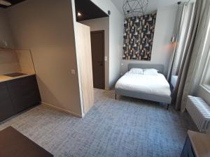 Appartements Le 12 studio neuf wifi app 11 : photos des chambres