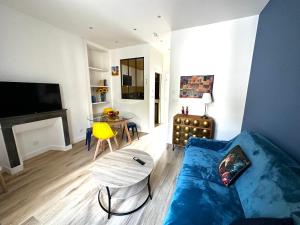 Appartements Maison des Fleurs T2 superbes a 10 min de ST et Soitec : photos des chambres