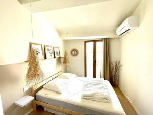 Appartements Maison charmante avec terrasse, 2 chambres : photos des chambres