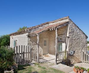 Maisons de vacances Maisonnette Lotoise en pierre blanche : photos des chambres