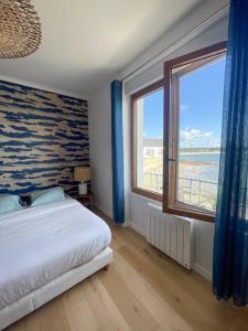 Appartements Appartement vue sur mer, plage et port de Lomener : photos des chambres