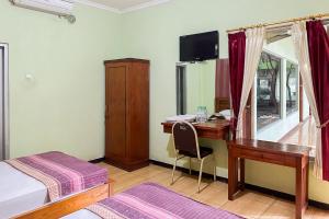 Global Inn Syariah Mitra RedDoorz near Juanda T1 Airport