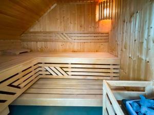 Ferienhaus Wiesengeflüster S1 - mit Sauna, Kamin und Workation an der Müritz