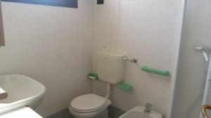 Flat with a lovely poolside garden with bbq