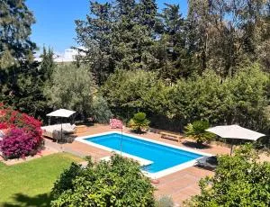 Arriba stijlvol appartement met zwembad en tuin - Los Naveros