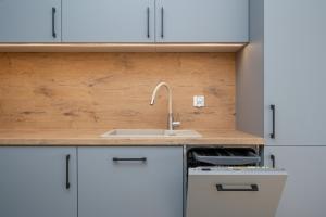 Wrocław 1-Bedroom Apartment with Parking & Balcony by Noclegi Renters