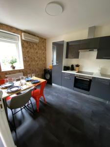 Appartements Les apparts du parc : photos des chambres