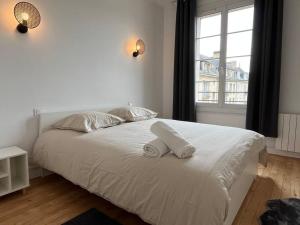 Appartements F2 lumineux avec parking prive : photos des chambres