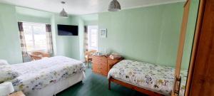 Family Room with Sea View room in The Mariner Hotel