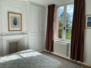B&B / Chambres d'hotes La petite mairie : photos des chambres