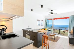 Modern cozy ocean view apartment near the beach with swimming pool in complex