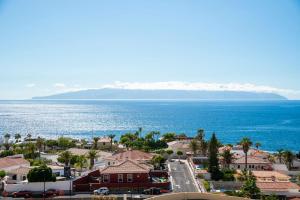 Modern cozy ocean view apartment near the beach with swimming pool in complex
