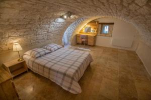 Maisons de vacances Maisonnette Lotoise en pierre blanche : photos des chambres