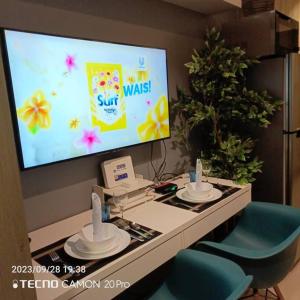 Cozy New 1BR Fame Residences Condo with Balcony