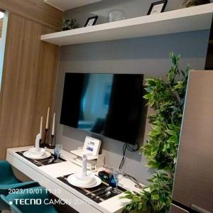 Cozy New 1BR Fame Residences Condo with Balcony