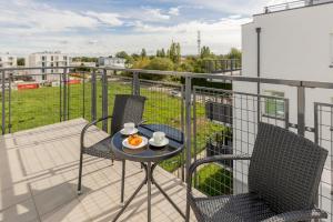 Szlachecka Apartment with Balcony & Parking Warsaw by Renters