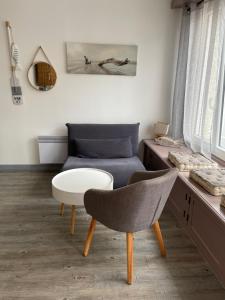 Maisons de vacances Plage et commerces a 50m, sans tele pour deconnecter ! : photos des chambres