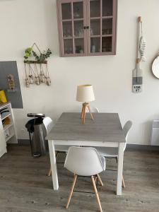 Maisons de vacances Plage et commerces a 50m, sans tele pour deconnecter ! : photos des chambres