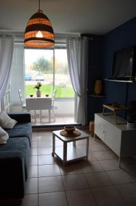 Appartements Le Petit Matelot, studio fonctionnel avec loggia : photos des chambres